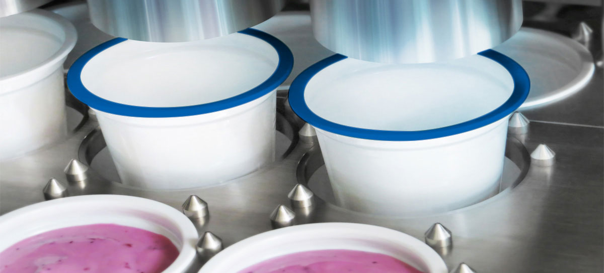 Fyllmaskiner bägare och flaskor